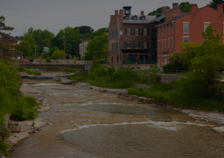 stream flowing under bridge