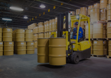 forklift moving barrels