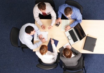 employees meeting at table